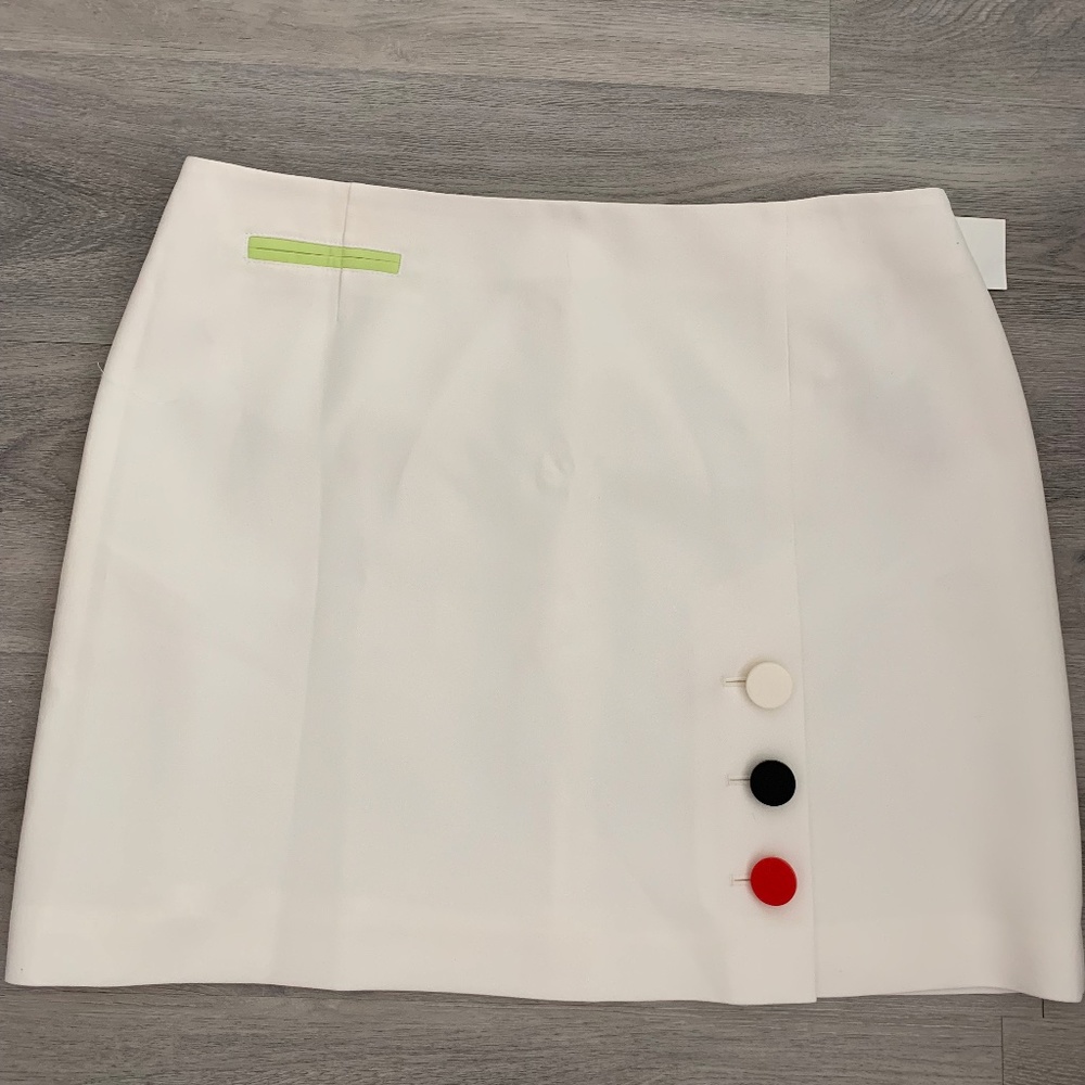 New with tags.  Anne Klein mini retro skirt size 14.